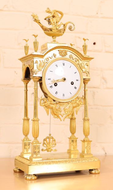 null GILT BRONZE PORTICO CLOCK RESTORATION 

In gilt bronze and chased, with four...