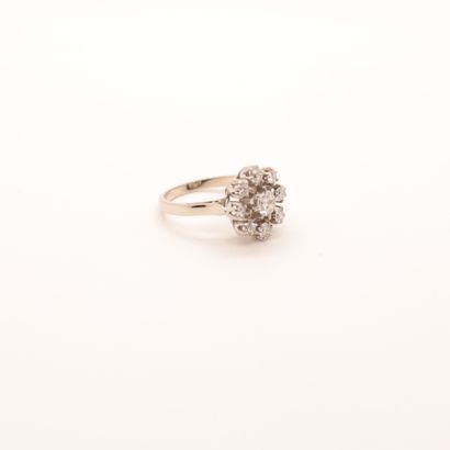 WHITE GOLD RING WITH 9 DIAMONDS 
Central...