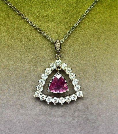 null 
White gold pendant centered with a RARE NATURAL PINK SAPHIR "TROIDIA" of beautiful...