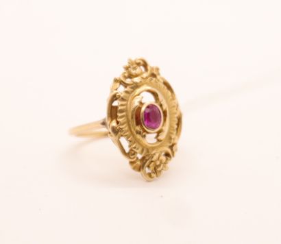 YELLOW GOLD OPENWORK RING WITH A SMALL RED...