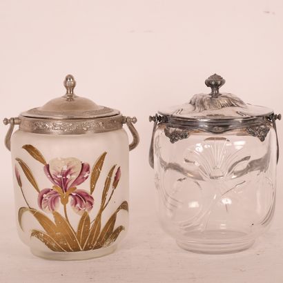 null TWO GLASS AND METAL COOKIE JARS 

One of which is Art Nouveau style with engraved...
