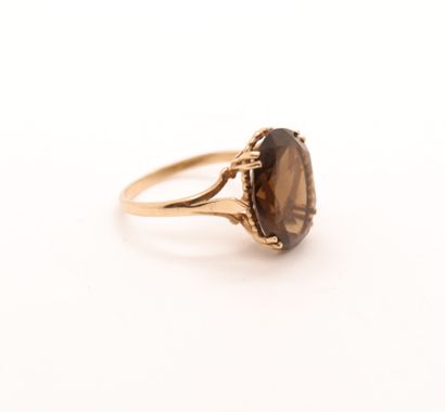 RING IN YELLOW GOLD 375/°° WITH LARGE AMBER...