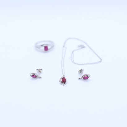 null WHITE GOLD AND RUBY SET WITH PEAR AND CUSHION CUT RUBIES AND DIAMONDS COMPOSED...