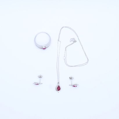 null WHITE GOLD AND RUBY SET WITH PEAR AND CUSHION CUT RUBIES AND DIAMONDS COMPOSED...