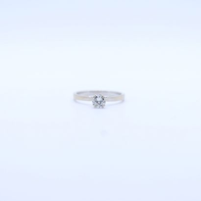 null SOLITAIRE RING IN WHITE GOLD WITH A BRILLIANT CUT DIAMOND OF ABOUT 0.4 CARAT
Tdd...