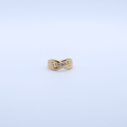 null YELLOW GOLD "KNOT" RING SET WITH 4 DIAMONDS 
Tdd : 48 
Pb : 3 grs