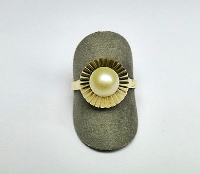 null Ring in Yellow Gold "Rayonnante" decorated with a PEARL OF CULTURE of 7 mm of...