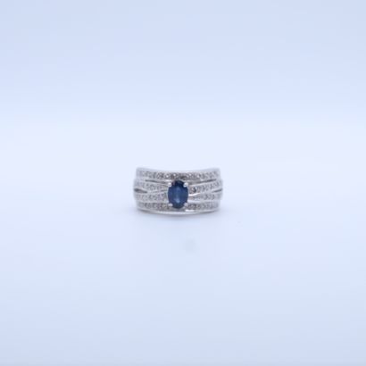null WHITE GOLD RING SET WITH A CUSHION CUT SAPPHIRE OF ABOUT 2.04 CARAT AND 4 ROWS...