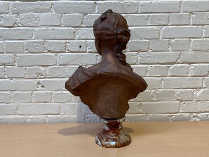 null TERRACOTTA BUST WITH PATINA REPRESENTING A WOMAN WITH A BARE RIGHT BREAST
Monogrammed...