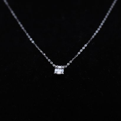 null Necklace in white gold 750°/. (18K) 0.90
Decorated with 10 diamonds for a total...