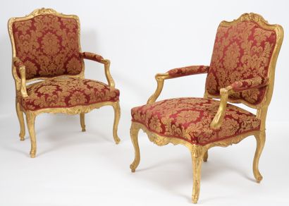 null PAIR OF GILTWOOD ARMCHAIRS LOUIS XV 
In gilded wood and carved with shells and...