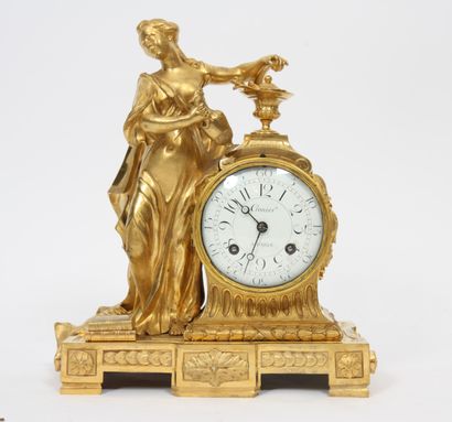 null GILT BRONZE CLOCK "À LA CRUCHE" LOUIS XVI
With a figure of a woman in the antique...