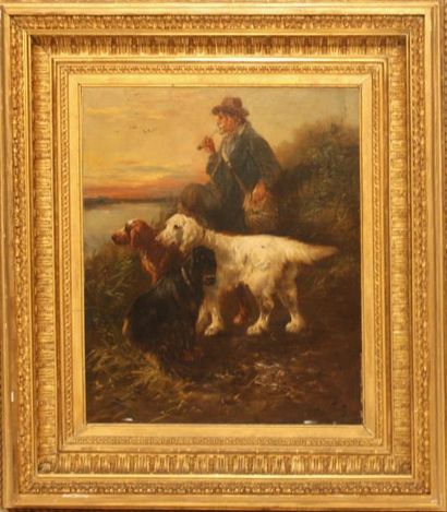 H.SCHOUTEN (1864-1927) Chasseur et ses chiens. Huile sur toile signée en bas à droite....