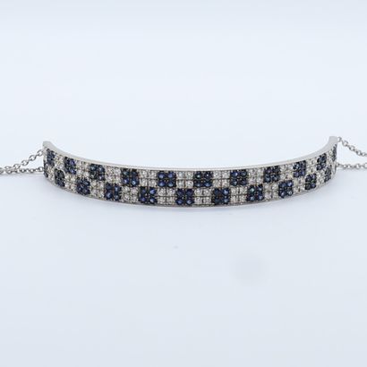 null BRACELET PAVAGE DE SAPHIR ET DIAMANTS
Bracelet rigide en or blanc 14 carats...