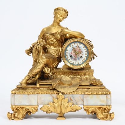 null GARNITURE A LA BELLE JARDINIERE

En bronze doré, marbre et porcelaine peinte.

Composée...