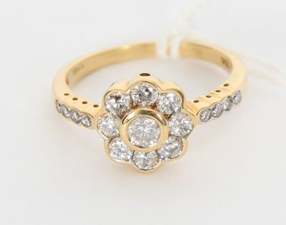 null BAGUE MARGUERITTE

En or jaune, diamants ronds 1 carat; 3,3 g environ 

taille:...