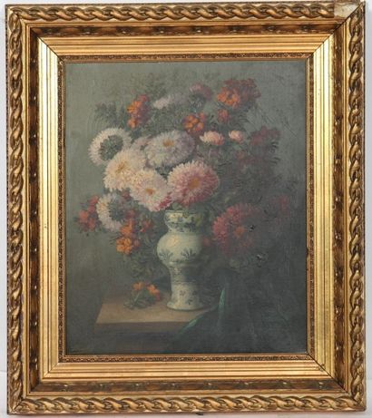 null TABLEAU "BOUQUET DE FLEURS" 

Huile sur toile encadrée représentant un bouquet...