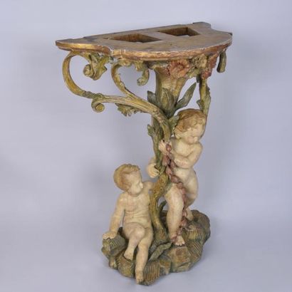 null RARE ET JOILE PAIRE DE CONSOLE D'APPLIQUES ITALIENNES 

En bois polychrome représentant...