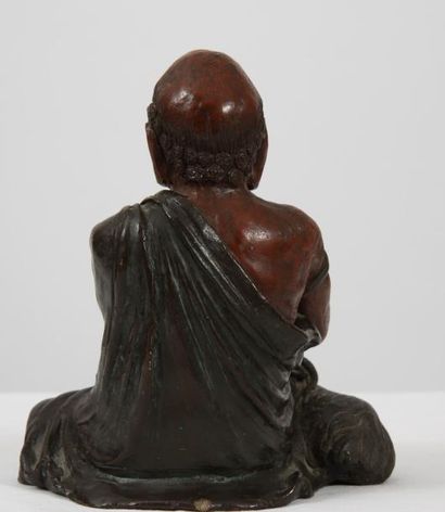 null "LUOHAN" CHINE

sage bouddhique figuré assis dans une posture de délassement,...