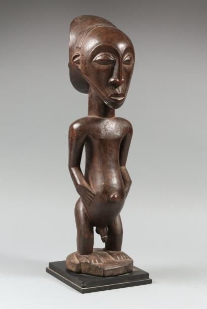 null STATUE D'ANCETRE AFRICAINE

Statue d'ancêtre, 

Style de Yambula, Hemba, représentant...