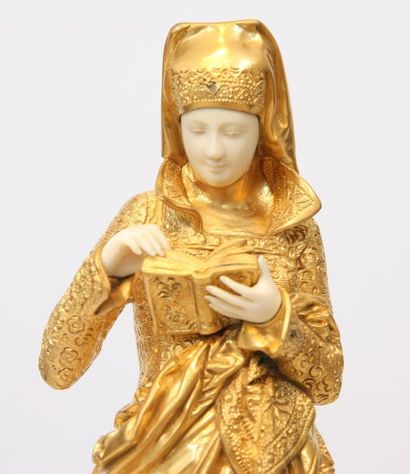 null CHRYSELEPHANTINE "LA LISEUSE" DE CARRIER-BELLEUSE (1824-1887)

En bronze doré,...