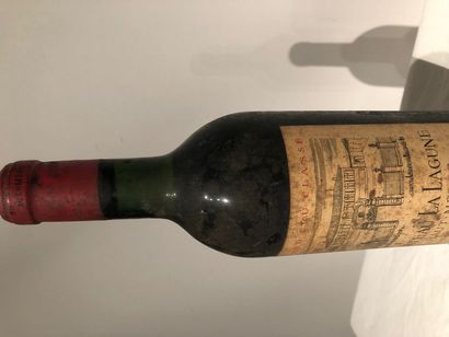 null 1 bouteille de "Château LA LAGUNE" 1964

Niveau base goulot.
