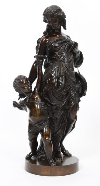 null IMPORTANT GROUPE EN BRONZE "MUSICIENNE AU PUTTO"

En bronze patiné, reposant...