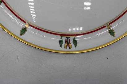 null CARTIER / Limoges. Round dish in polychrome porcelain decorated with panther....