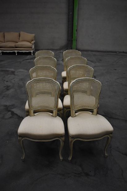 null Suite of 8 chairs in molded wood, cane back and cambered legs. Louis XV style....