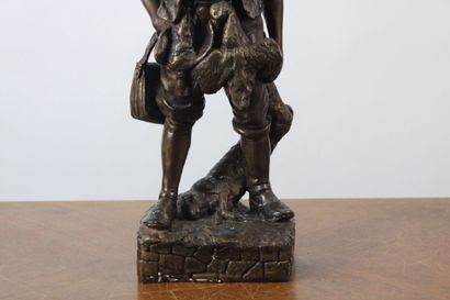 null Ecole du début du XIXème siècle. 
Enfant chasseur, bronze à patine brune, signé...