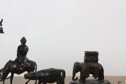null CHINA.
Meeting of bronze objects including a lantern in the shape of a traditional...