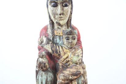 null Ecole espagnole du XXème siècle.
Vierge à l'enfant en bois sculpté polychrome....