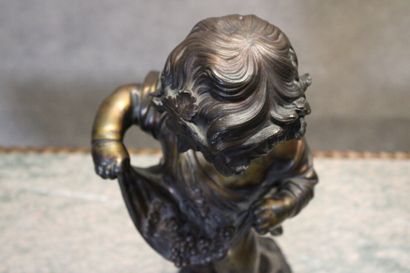 null In the taste of the XVIIIth century
Putto, bronze with double brown and gilded...