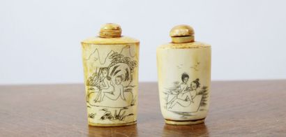 null CHINA. Meeting of two bone snuffboxes decorated with engraved erotic scenes....