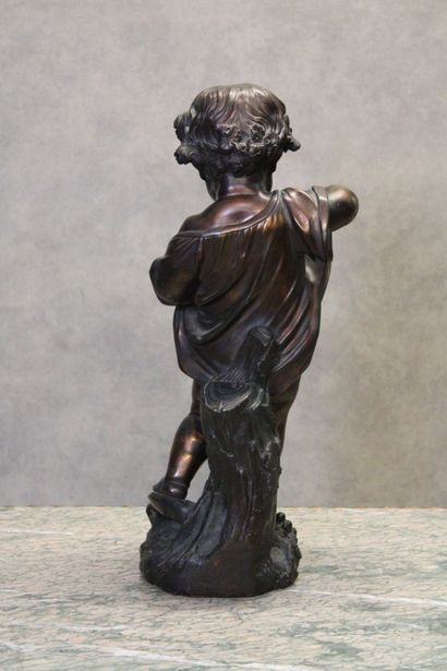 null In the taste of the XVIIIth century
Putto, bronze with double brown and gilded...