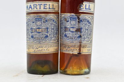 null Meeting of 2 bottles of Cognac. Martel. 
Level: -6.5 cm under the cap. 
Torn...