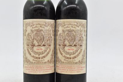 null 2 bottles of Château Longueville 1973. 
Level: -2 and -3.5 cm under the capsule....