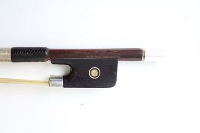 null Charles Alfred Bazin violin bow signed, in pernambuco mounted silver. 59gr with...
