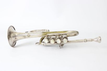 null Henri Selmer Piccolo trumpet with four valves. Silver plated model. Number 69813,...