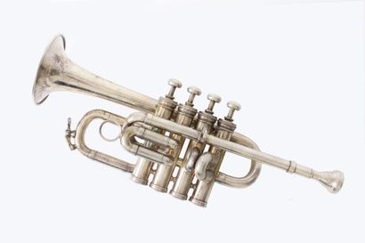 null Henri Selmer Piccolo trumpet with four valves. Silver plated model. Number 69813,...