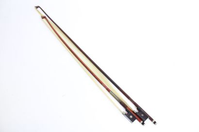 null Set of 2 violin bows. 1 bow 3/4 by Ary France signed in pernambour mounted nickel...
