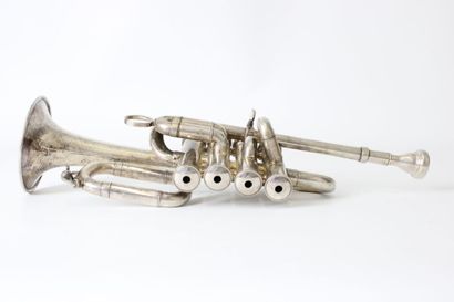 null Henri Selmer Piccolo trumpet with four valves. Silver plated model. Number 69813,...