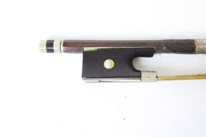 null Violin bow in the style of Pierre Cuniot, in pernambuco mounted nickel silver....