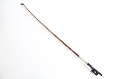 null Charles Alfred Bazin violin bow signed, in pernambuco mounted silver. 59gr with...