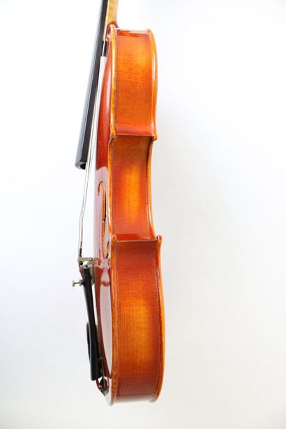 null German 3/4 violin made around 1960. Two pieces back 337mm. Good condition.
Expert:...