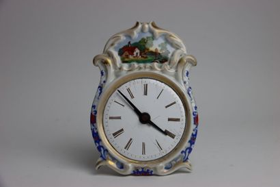 Small porcelain clock in the taste of the...