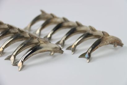 Meeting of twelve silver plated dolphin knife...