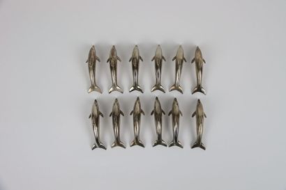 null Réunion de douze porte-couteaux dauphins en métal argenté. Longueur : 7,5 cm....