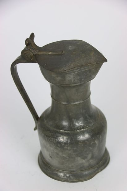 null LAUSANNE - Pewter shoulder pitcher with buds, hallmark on the lid: lion passant...
