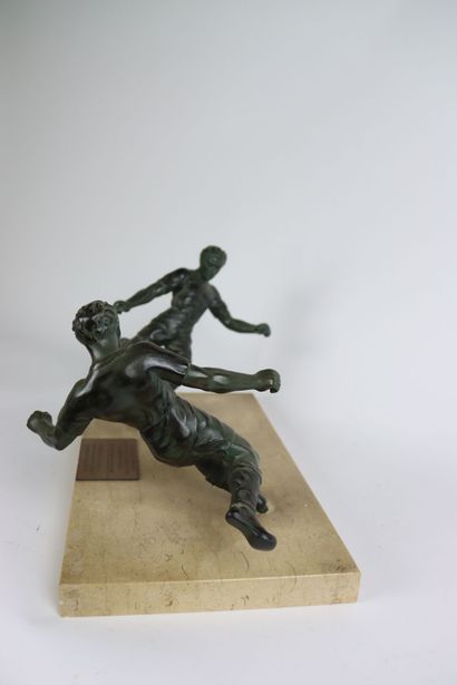 null ANONYMOUS, Two soccer players in regula on a marble plate. Statuettes in patinated...